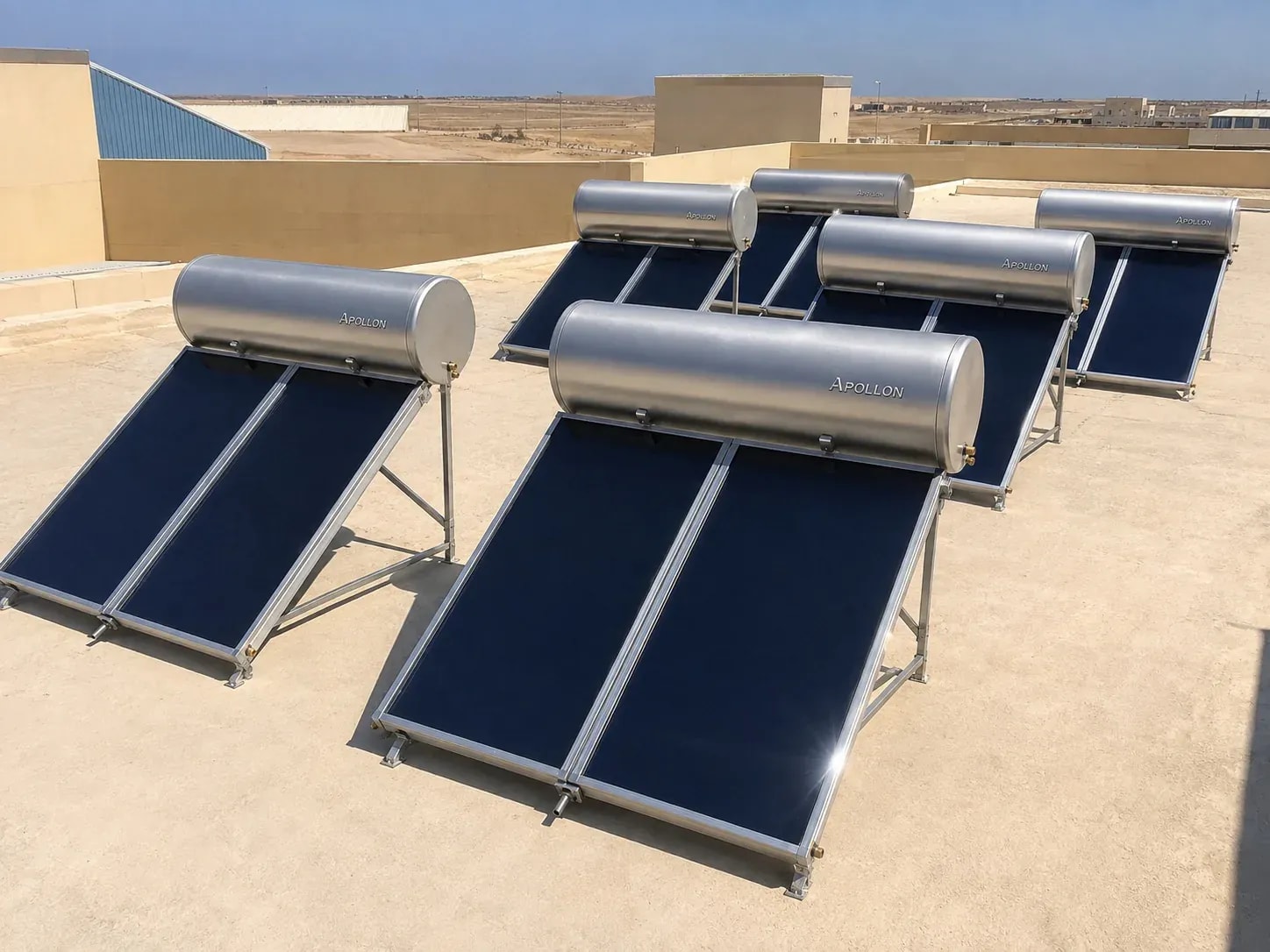 Solar water heaters on a rooftop in a desert setting