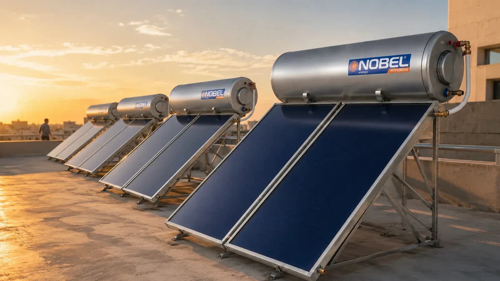 A row of Nobel solar heaters on a rooftop at sunset